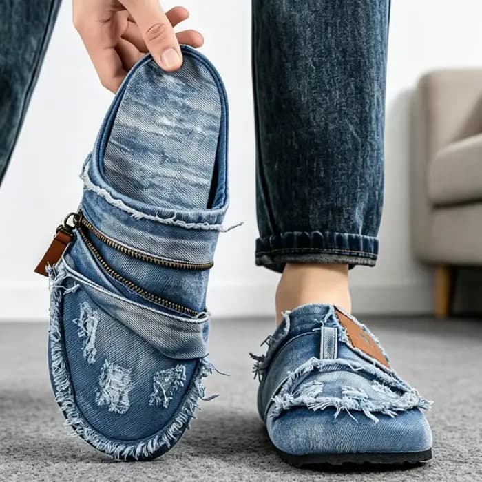 Mules en denim bleu clair avec bords effilochés
