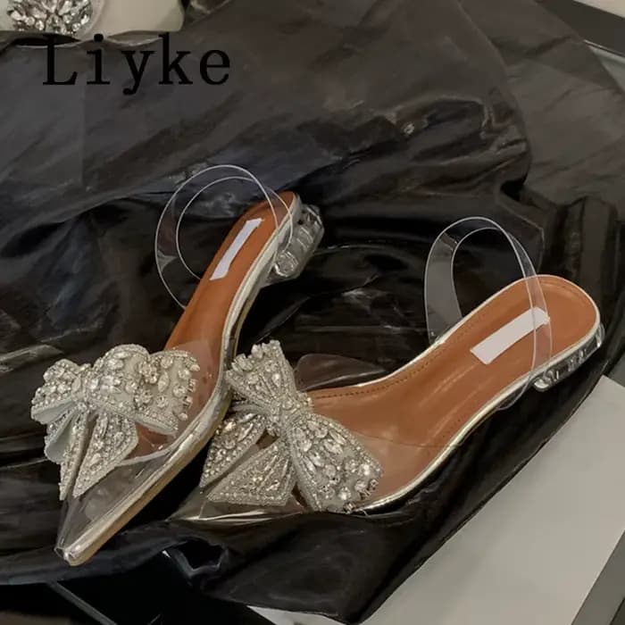 Liyke Design de mode cristal nœud papillon femmes pompes Sexy bout pointu Mules bas talons carrés Slingback chaussures PVC sandales transparentes