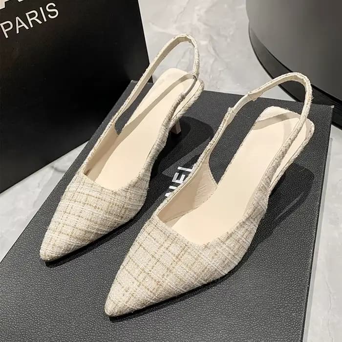 Marque de mode qui a conçu des talons compensés en tricot pour femmes, des chaussures de soirée à bout pointu, des sandales à talons aiguilles confortables et grandes tailles pour l'été.