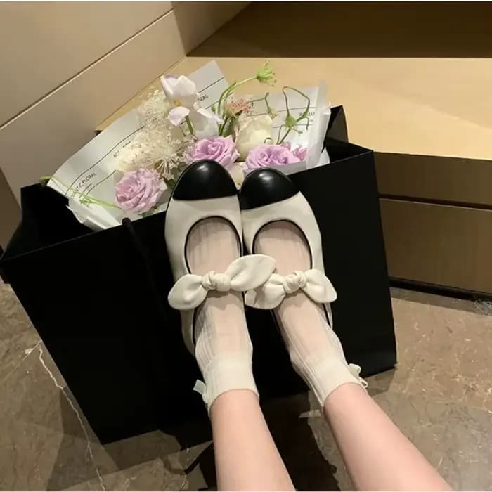 Chaussures plates femmes printemps été nœud épissage tête ronde en peau de mouton polyvalent réduction de l'âge bouche