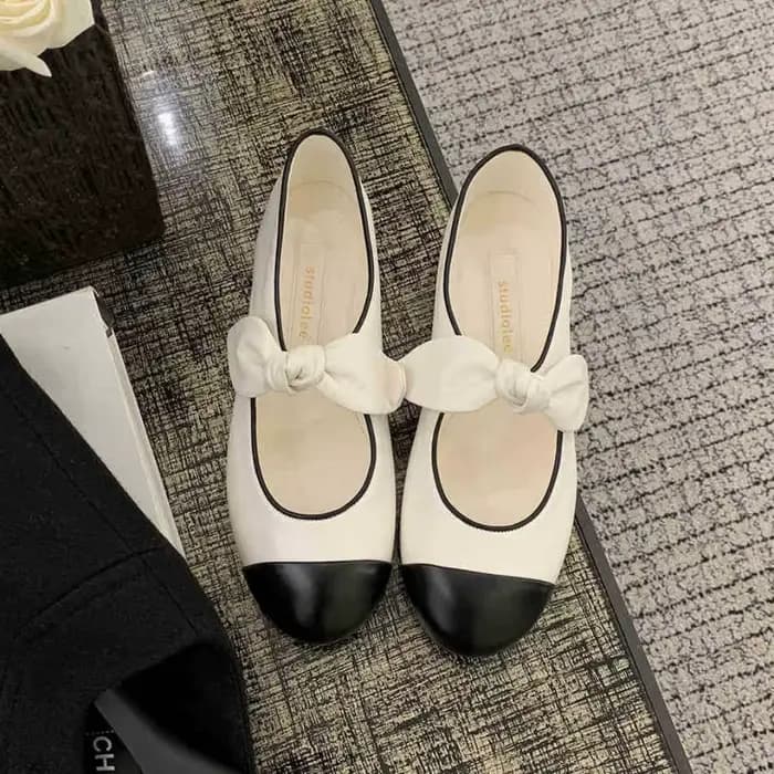 Chaussures plates femmes printemps été nœud épissage tête ronde en peau de mouton polyvalent réduction de l'âge bouche