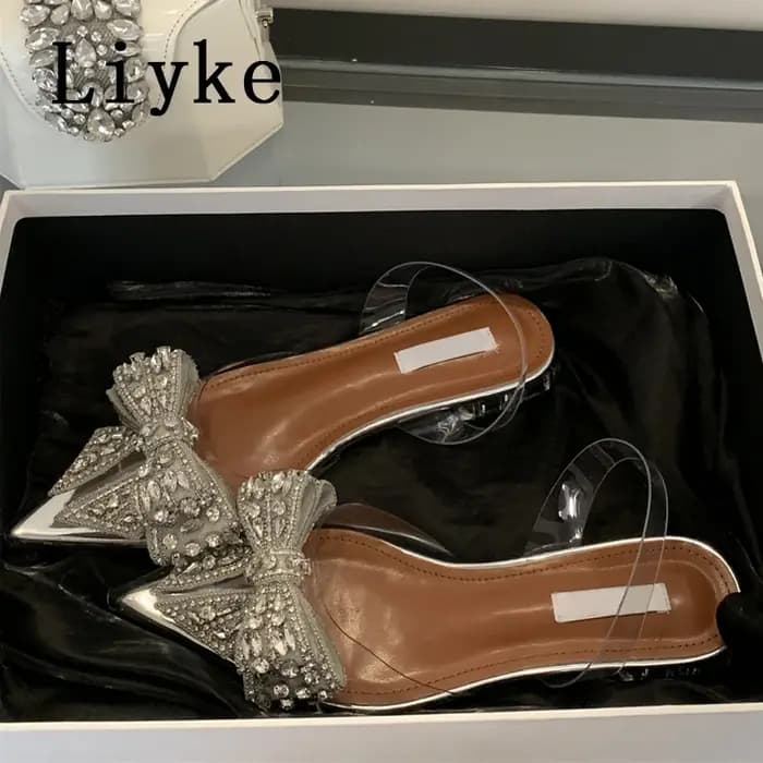 Liyke Design de mode cristal nœud papillon femmes pompes Sexy bout pointu Mules bas talons carrés Slingback chaussures PVC sandales transparentes
